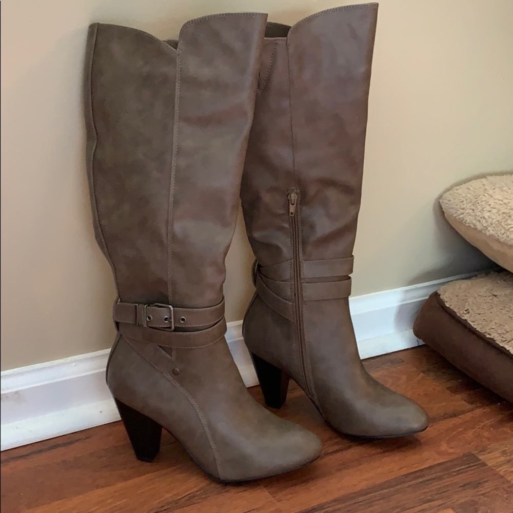 Over the calf boots with 2 in heel. True to size